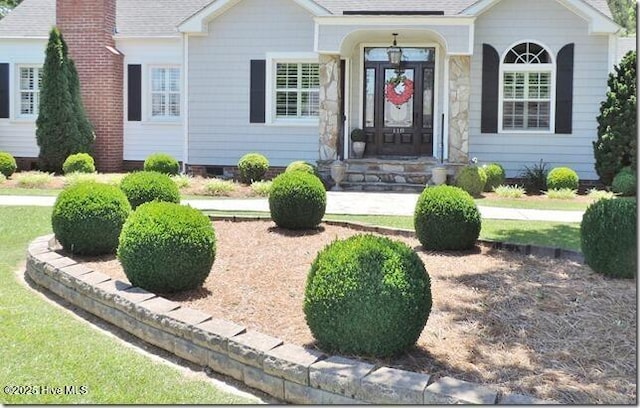 110 E Blalock Rd, Lucama, NC 27851 - entrance to property with roof with shingles and a chimney
