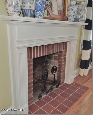 110 E Blalock Rd, Lucama, NC 27851 - detailed view of a fireplace and wood finished floors
