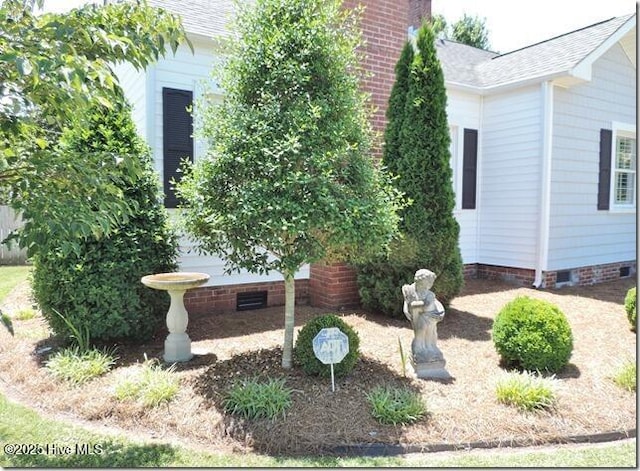 110 E Blalock Rd, Lucama, NC 27851 - view of property exterior with crawl space, roof with shingles, and a chimney