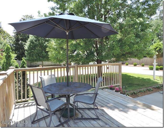 110 E Blalock Rd, Lucama, NC 27851 - deck featuring outdoor dining space