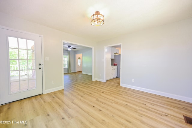 159 Dockside Dr, Jacksonville, NC 28546 - unfurnished dining area with light wood finished floors, baseboards, and a ceiling fan