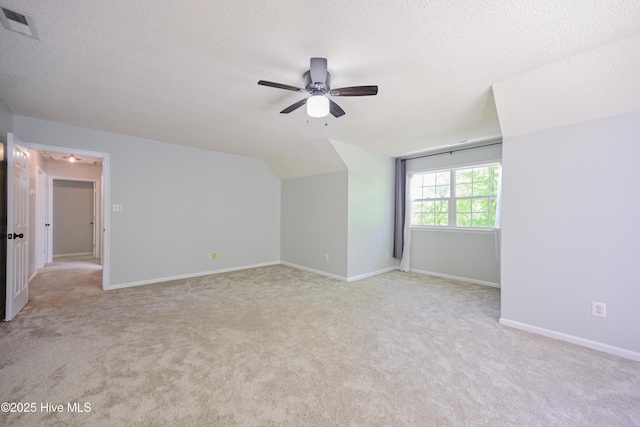 159 Dockside Dr, Jacksonville, NC 28546 - bonus room with a ceiling fan, a textured ceiling, carpet, vaulted ceiling, and baseboards