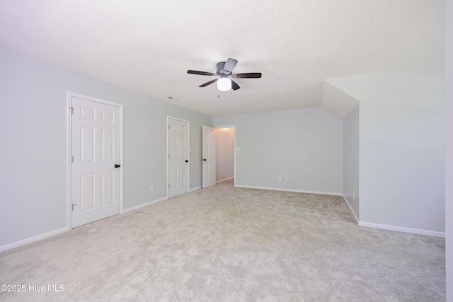 159 Dockside Dr, Jacksonville, NC 28546 - unfurnished bedroom featuring carpet, baseboards, ceiling fan, and a textured ceiling