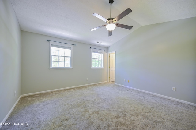 159 Dockside Dr, Jacksonville, NC 28546 - unfurnished room featuring ceiling fan, carpet, lofted ceiling, and baseboards