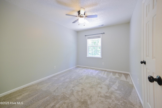 159 Dockside Dr, Jacksonville, NC 28546 - carpeted spare room featuring a ceiling fan, a textured ceiling, and baseboards