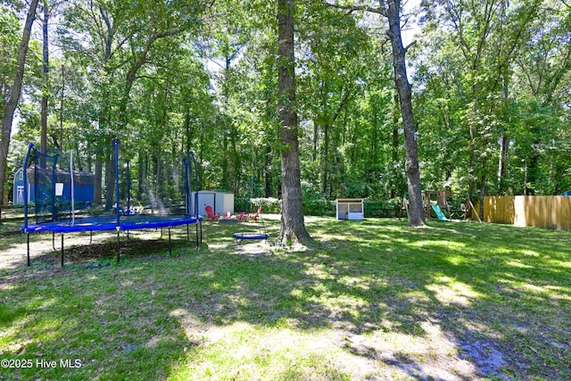 159 Dockside Dr, Jacksonville, NC 28546 - view of yard with a trampoline and a playground