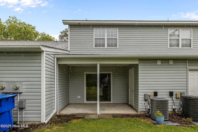 202 Courtyard W, Newport, NC 28570 - back of house featuring a patio