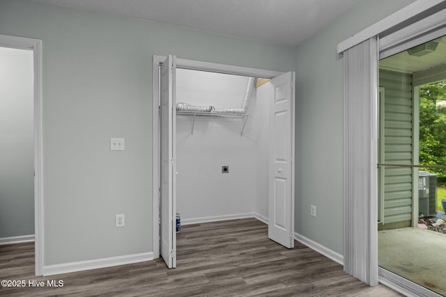 202 Courtyard W, Newport, NC 28570 - washroom with electric dryer hookup and wood finished floors