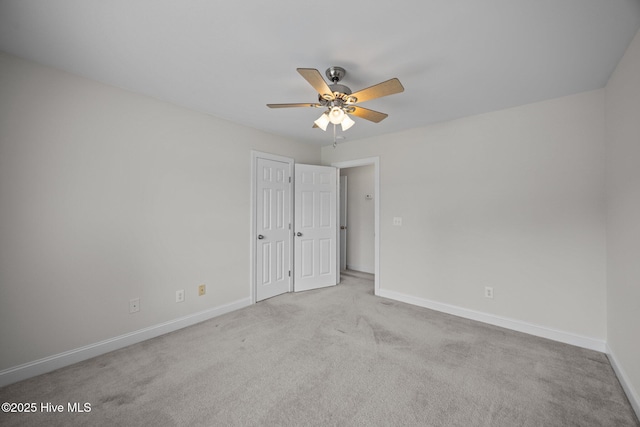 3107 Indian Wells Pl, Greenville, NC 27858 - unfurnished bedroom featuring baseboards, carpet flooring, a ceiling fan, and a closet