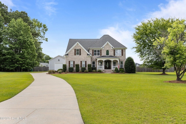 3107 Indian Wells Pl, Greenville, NC 27858 - view of front of home with brick siding, concrete driveway, and a garage