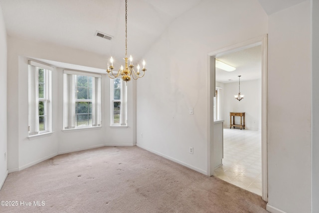 6814 Lipscomb Dr, Wilmington, NC 28412 - carpeted empty room featuring a chandelier and baseboards
