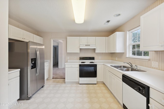 6814 Lipscomb Dr, Wilmington, NC 28412 - kitchen featuring electric range oven, dishwasher, under cabinet range hood, stainless steel fridge with ice dispenser, and a sink