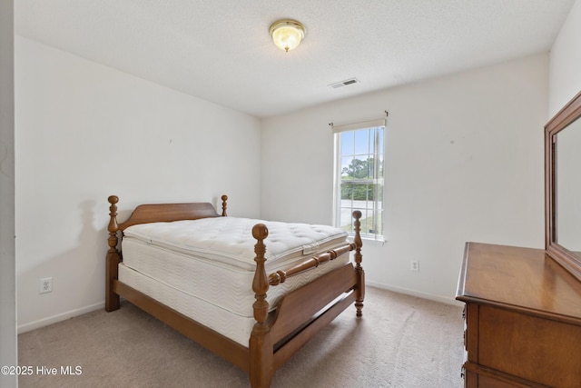 6814 Lipscomb Dr, Wilmington, NC 28412 - bedroom with light colored carpet and baseboards