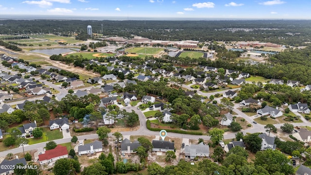 6814 Lipscomb Dr, Wilmington, NC 28412 - aerial overview of property's location with a large body of water and nearby suburban area