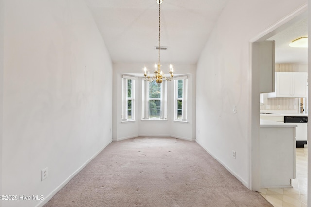 6814 Lipscomb Dr, Wilmington, NC 28412 - unfurnished dining area featuring a chandelier, light carpet, and baseboards
