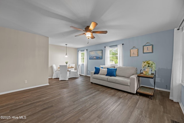 210 Glenburnie Dr, New Bern, NC 28560 - living area featuring dark wood-type flooring, ceiling fan, and baseboards