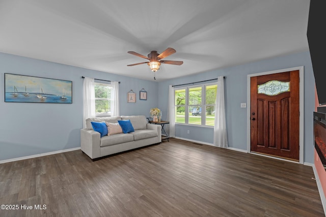 210 Glenburnie Dr, New Bern, NC 28560 - living area featuring dark wood-type flooring, a ceiling fan, and baseboards