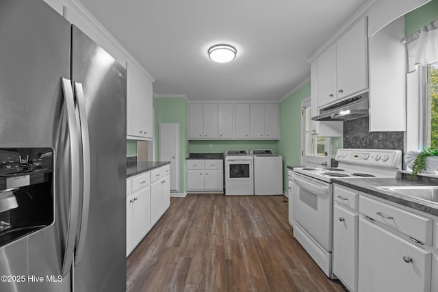 210 Glenburnie Dr, New Bern, NC 28560 - kitchen featuring stainless steel fridge, white range with electric cooktop, separate washer and dryer, under cabinet range hood, and dark countertops