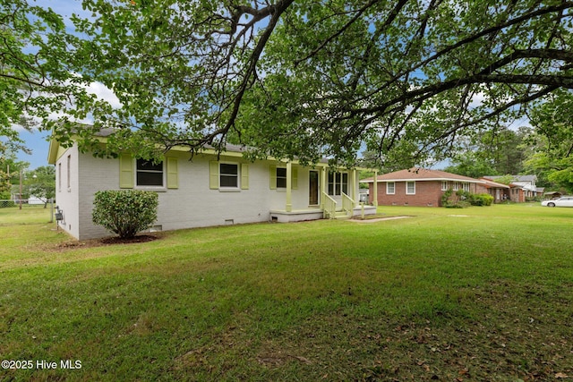 210 Glenburnie Dr, New Bern, NC 28560 - rear view of property with brick siding, crawl space, and a yard