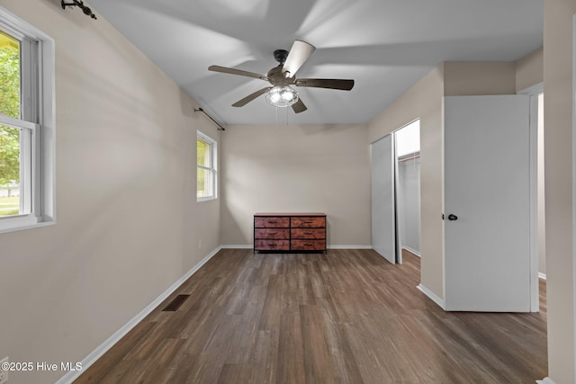 210 Glenburnie Dr, New Bern, NC 28560 - unfurnished bedroom with wood finished floors, baseboards, a ceiling fan, and a closet
