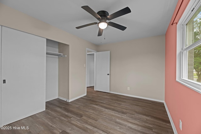 210 Glenburnie Dr, New Bern, NC 28560 - unfurnished bedroom with wood finished floors, baseboards, a closet, and ceiling fan