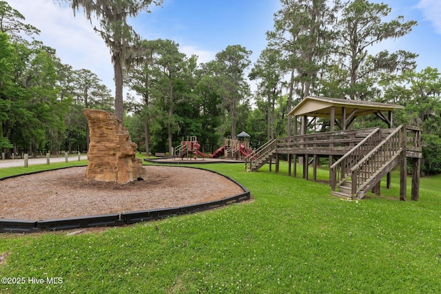 210 Glenburnie Dr, New Bern, NC 28560 - view of grassy yard featuring stairs, view of wooded area, and a wooden deck