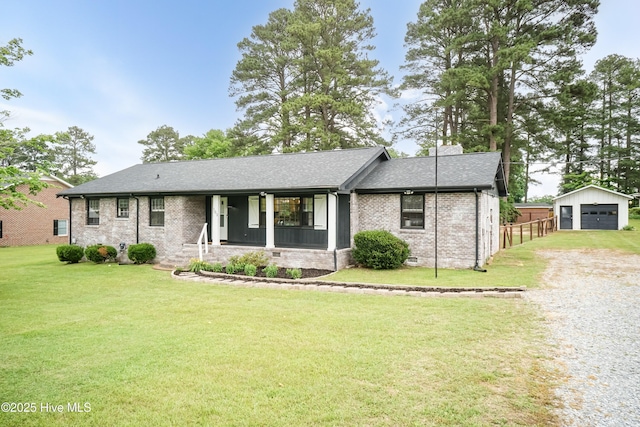 103 Midway Ln, Roanoke Rapids, NC 27870 - ranch-style house with driveway, a garage, an outbuilding, brick siding, and covered porch