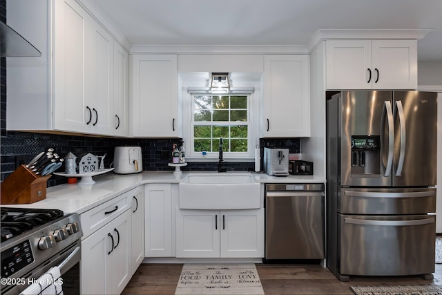 103 Midway Ln, Roanoke Rapids, NC 27870 - kitchen featuring appliances with stainless steel finishes, a sink, white cabinets, and light countertops