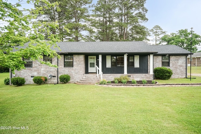 103 Midway Ln, Roanoke Rapids, NC 27870 - ranch-style home with a front yard, brick siding, and a shingled roof