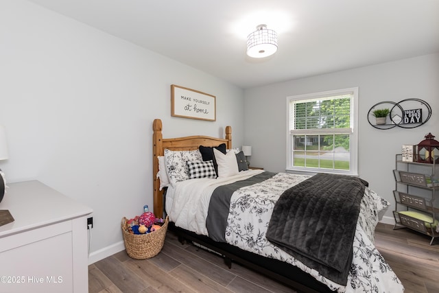 103 Midway Ln, Roanoke Rapids, NC 27870 - bedroom featuring wood finished floors and baseboards