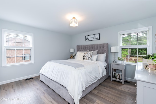 103 Midway Ln, Roanoke Rapids, NC 27870 - bedroom with wood finished floors and baseboards