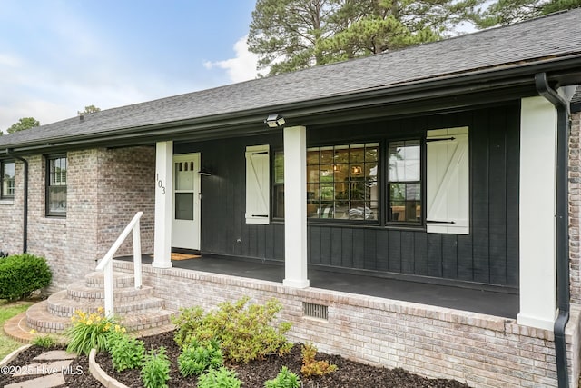 103 Midway Ln, Roanoke Rapids, NC 27870 - property entrance featuring a porch and brick siding
