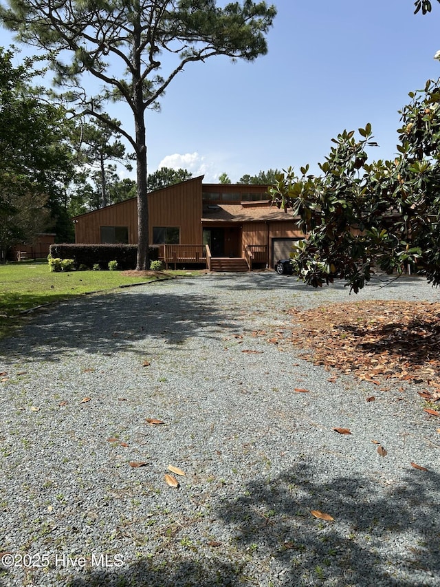 106 Eagle Ln, Hampstead, NC 28443 - view of front of home featuring gravel driveway