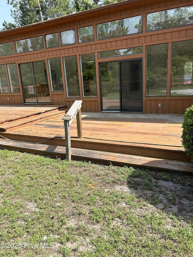 106 Eagle Ln, Hampstead, NC 28443 - wooden terrace featuring a sunroom