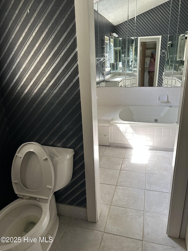 106 Eagle Ln, Hampstead, NC 28443 - full bath with tile patterned flooring, toilet, and a bath