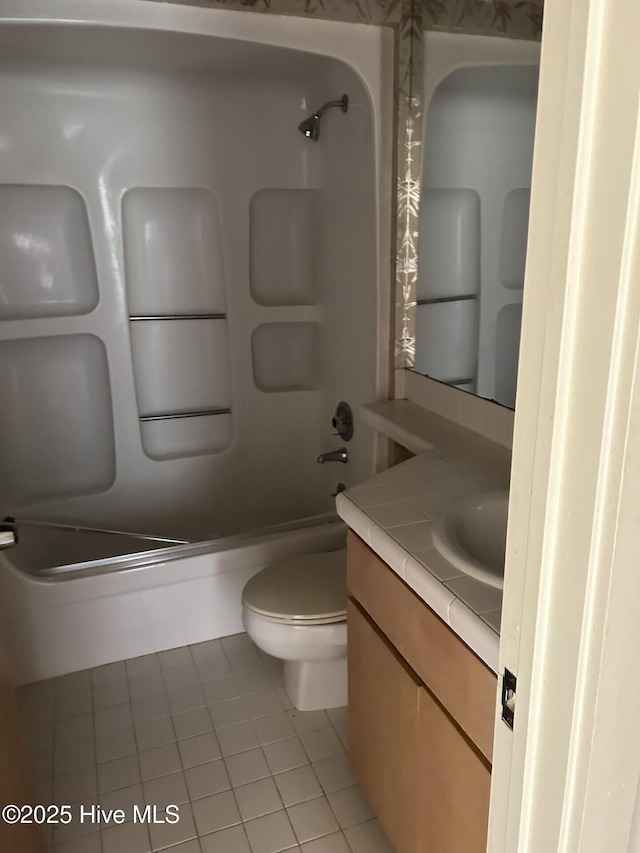 106 Eagle Ln, Hampstead, NC 28443 - full bath featuring shower / bathtub combination, vanity, tile patterned floors, and toilet