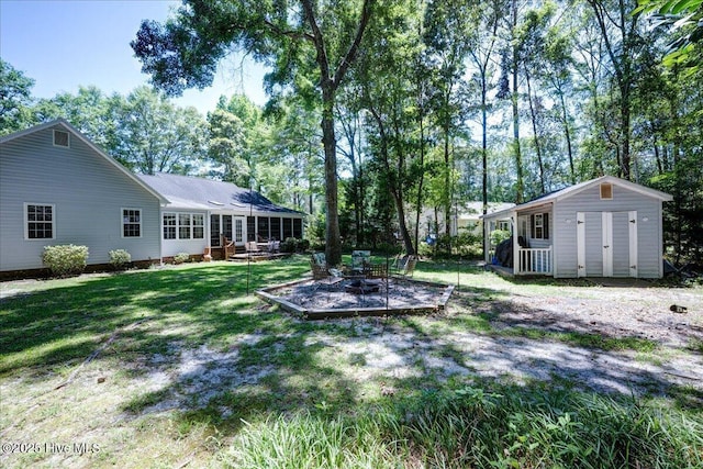 547 Deer Run Rd, New Bern, NC 28562 - view of grassy yard with an outbuilding and view of scattered trees