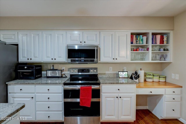 547 Deer Run Rd, New Bern, NC 28562 - kitchen with appliances with stainless steel finishes, dark wood-type flooring, white cabinetry, and light stone countertops