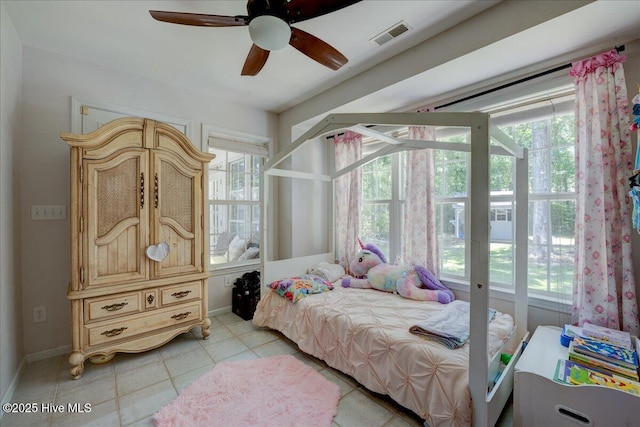 547 Deer Run Rd, New Bern, NC 28562 - bedroom with light tile patterned floors, baseboards, and ceiling fan