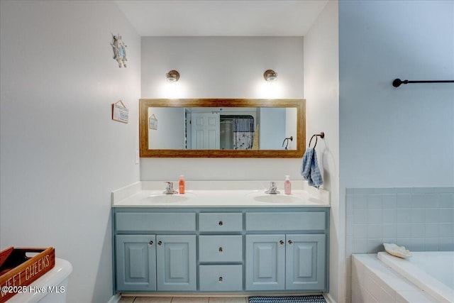 547 Deer Run Rd, New Bern, NC 28562 - bathroom with double vanity, a garden tub, and toilet