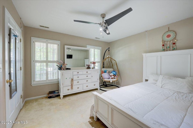 547 Deer Run Rd, New Bern, NC 28562 - bedroom with multiple windows, light colored carpet, a ceiling fan, and baseboards