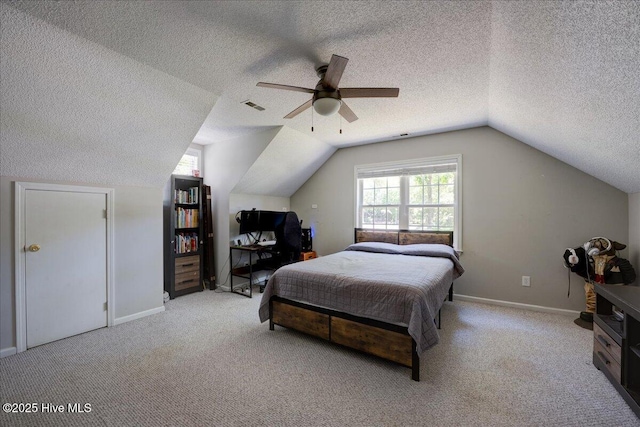 547 Deer Run Rd, New Bern, NC 28562 - carpeted bedroom featuring a textured ceiling, vaulted ceiling, ceiling fan, and baseboards