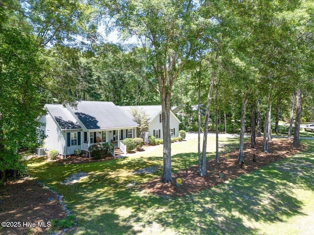 547 Deer Run Rd, New Bern, NC 28562 - ranch-style house with covered porch, a front yard, and roof with shingles