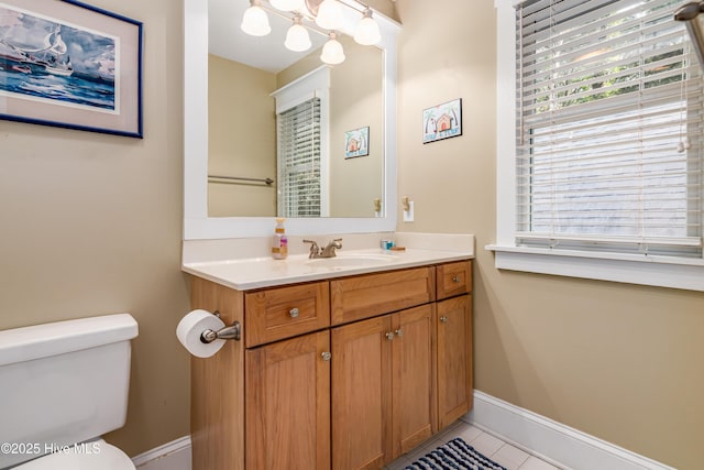 20 Fort Holmes Trl, Bald Head Island, NC 28461 - bathroom featuring toilet, vanity, tile patterned flooring, and baseboards