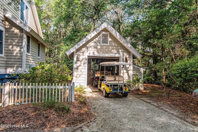 20 Fort Holmes Trl, Bald Head Island, NC 28461 - view of outbuilding featuring driveway