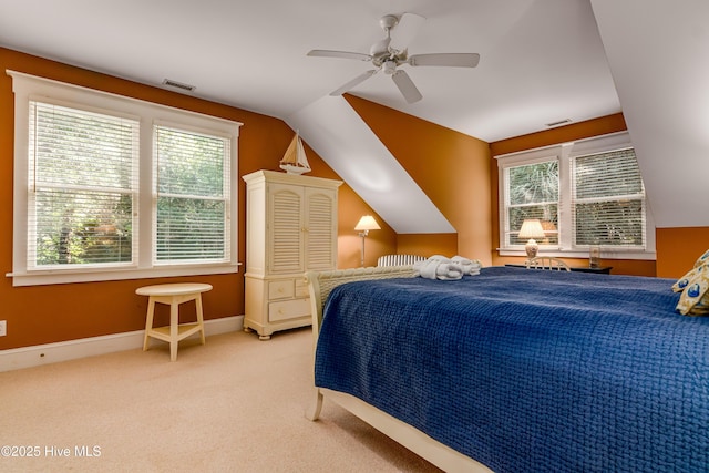 20 Fort Holmes Trl, Bald Head Island, NC 28461 - bedroom featuring multiple windows, lofted ceiling, carpet, a ceiling fan, and baseboards