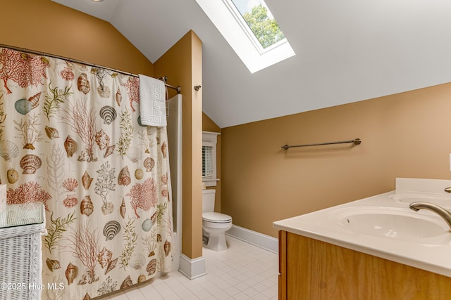 20 Fort Holmes Trl, Bald Head Island, NC 28461 - full bath with a skylight, vaulted ceiling, toilet, vanity, and tile patterned flooring