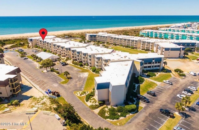 1904 E Fort Macon Rd Unit 269, Atlantic Beach, NC 28512 - bird's eye view of apartment complex and waterfront with a beach