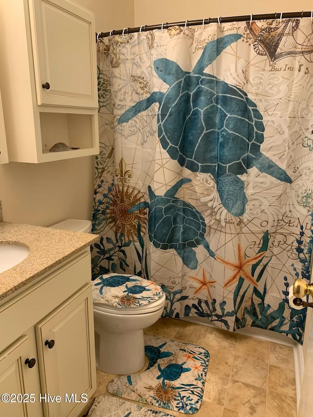 1904 E Fort Macon Rd Unit 269, Atlantic Beach, NC 28512 - bathroom featuring vanity, toilet, and a shower with shower curtain