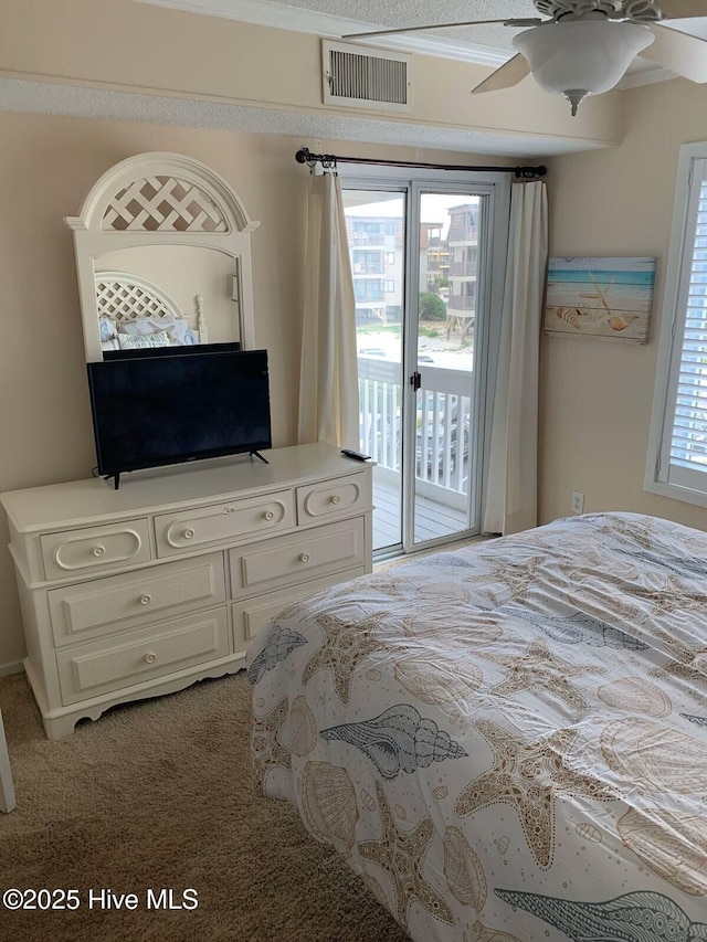 1904 E Fort Macon Rd Unit 269, Atlantic Beach, NC 28512 - bedroom featuring access to exterior, carpet, and ceiling fan